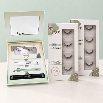 Glashes Bundle mit gefüllter Travelbox und zwei Wunschboxen mit insgesamt acht Wimpernpaaren